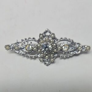 Elegant Silver and Pearl Brooch